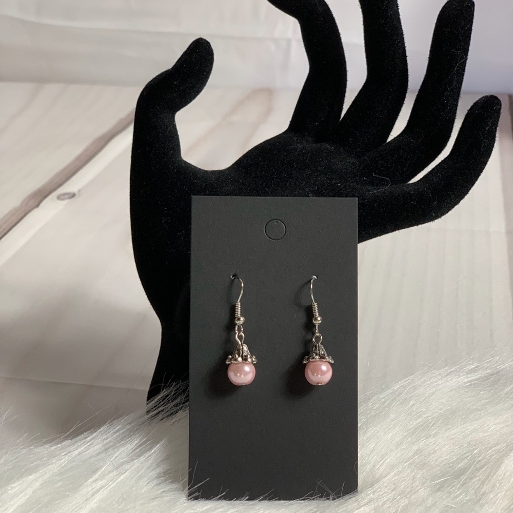 Pink pearly earrings (second from left) Gorgeous